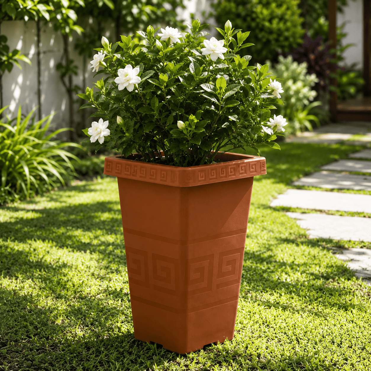 Maceta en jardín